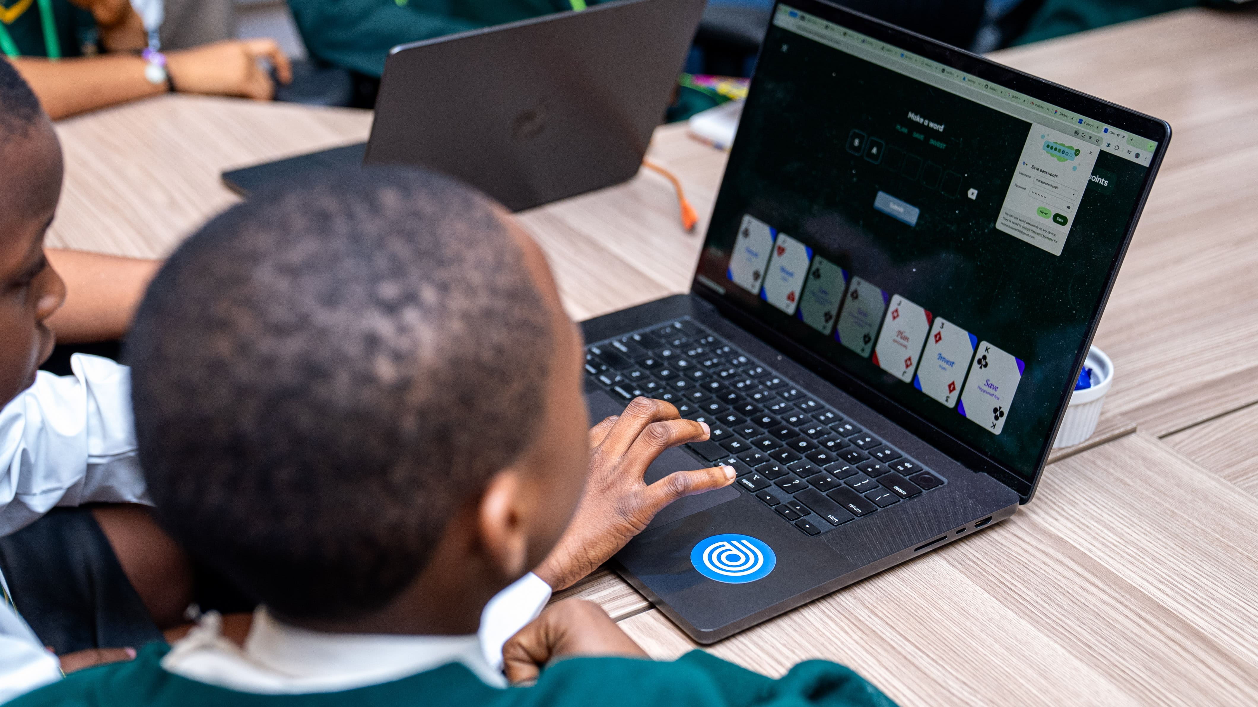 Students of Gopherwood School testing Cowrywise Kids - the financial app for kids