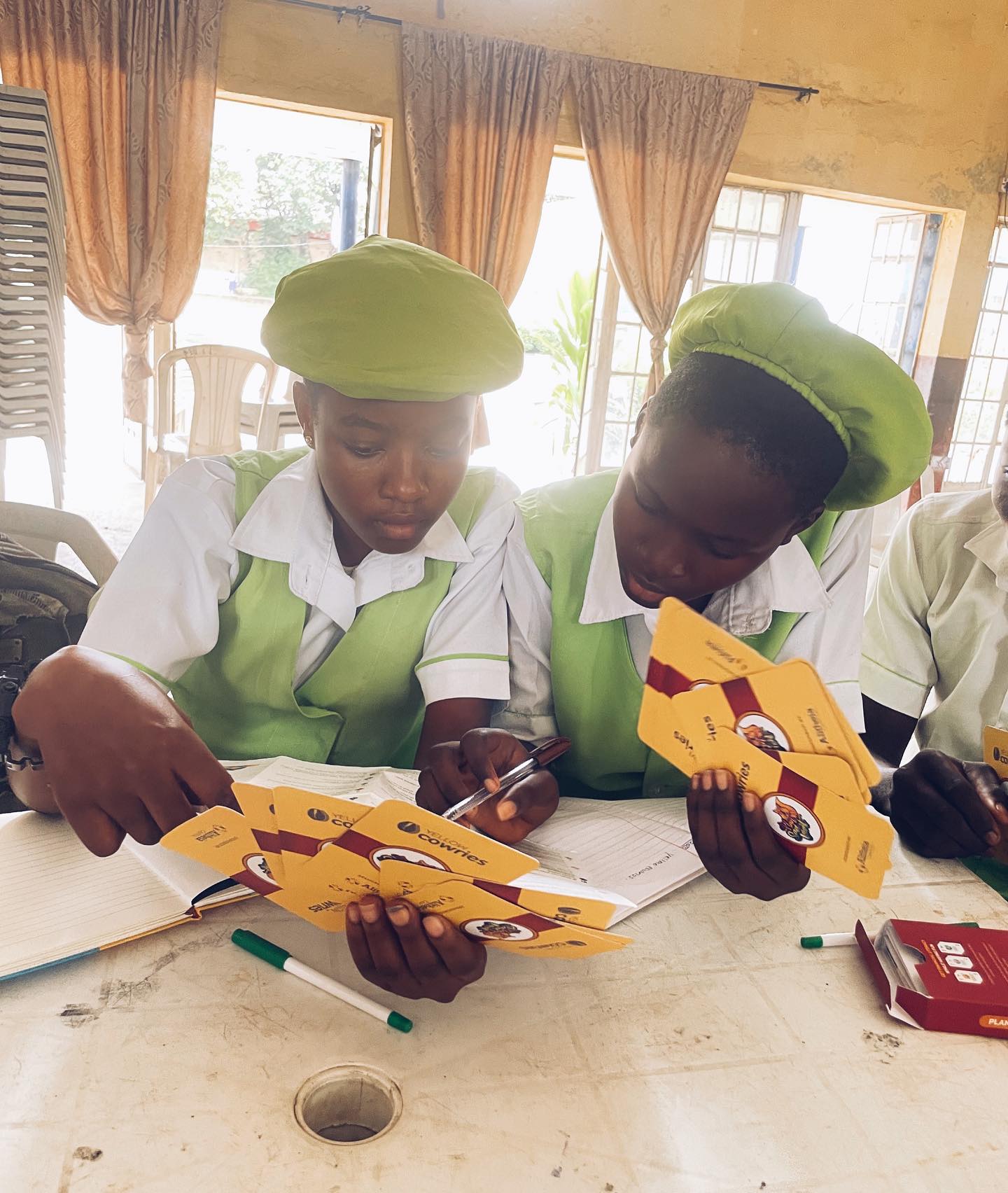 Yellow Cowries PSI Card game for financial education